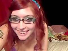 Emo wearing glasses reveals knockers on webcam