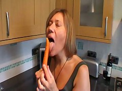 Mature play with herself in kitchen