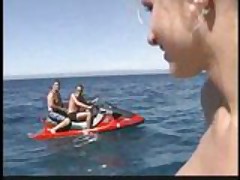 Busty blonde rides on boat